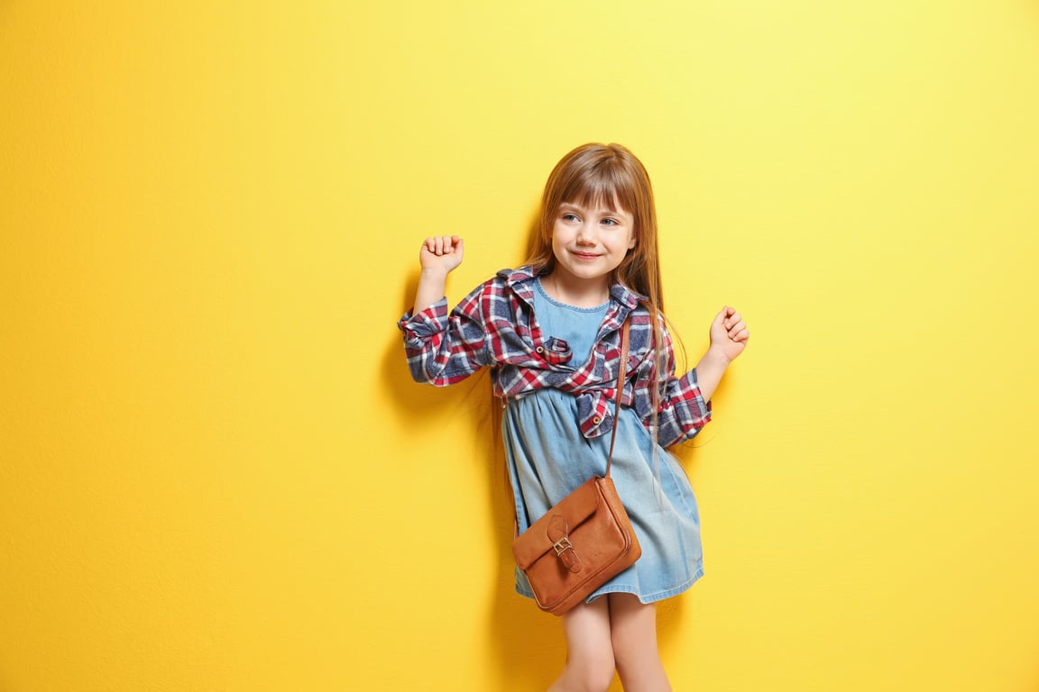 A Little Girl Wearing Kids Fashion